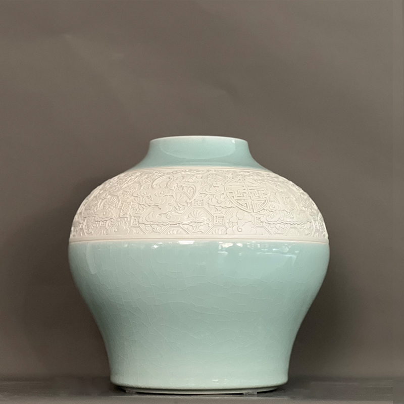 青釉福寿雕刻罐